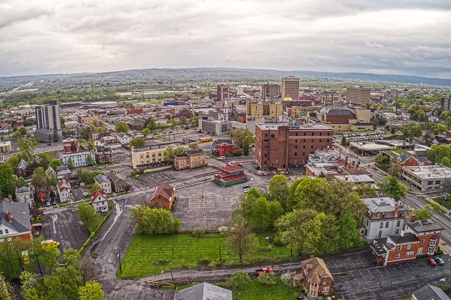 New Hartford NY - Aerial View of Downtown New Hartford New York with Views of Commercial Buildings and Homes